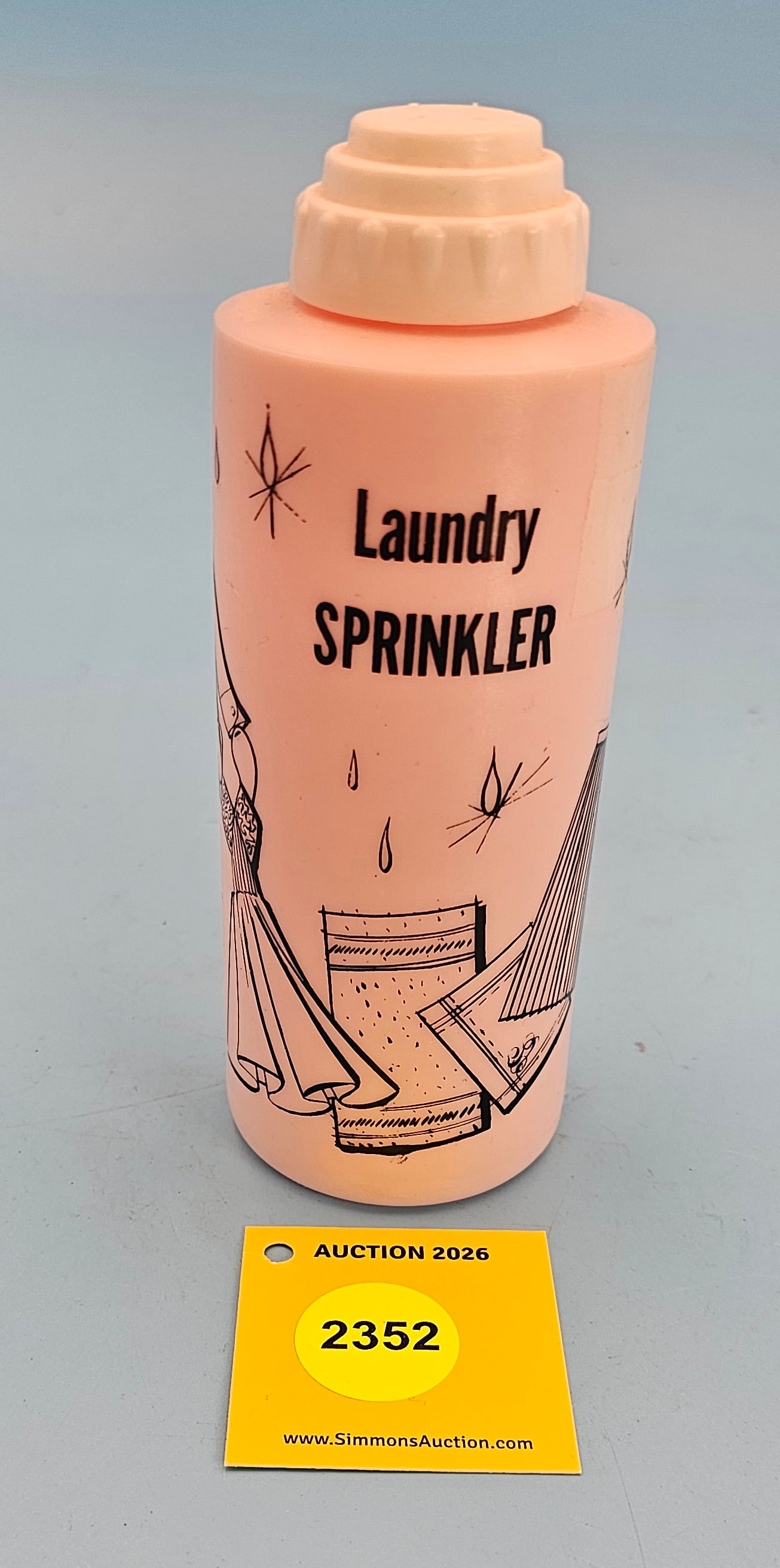 Pink plastic Laundry Sprinkler bottle 6 1/2" (1 of 1)