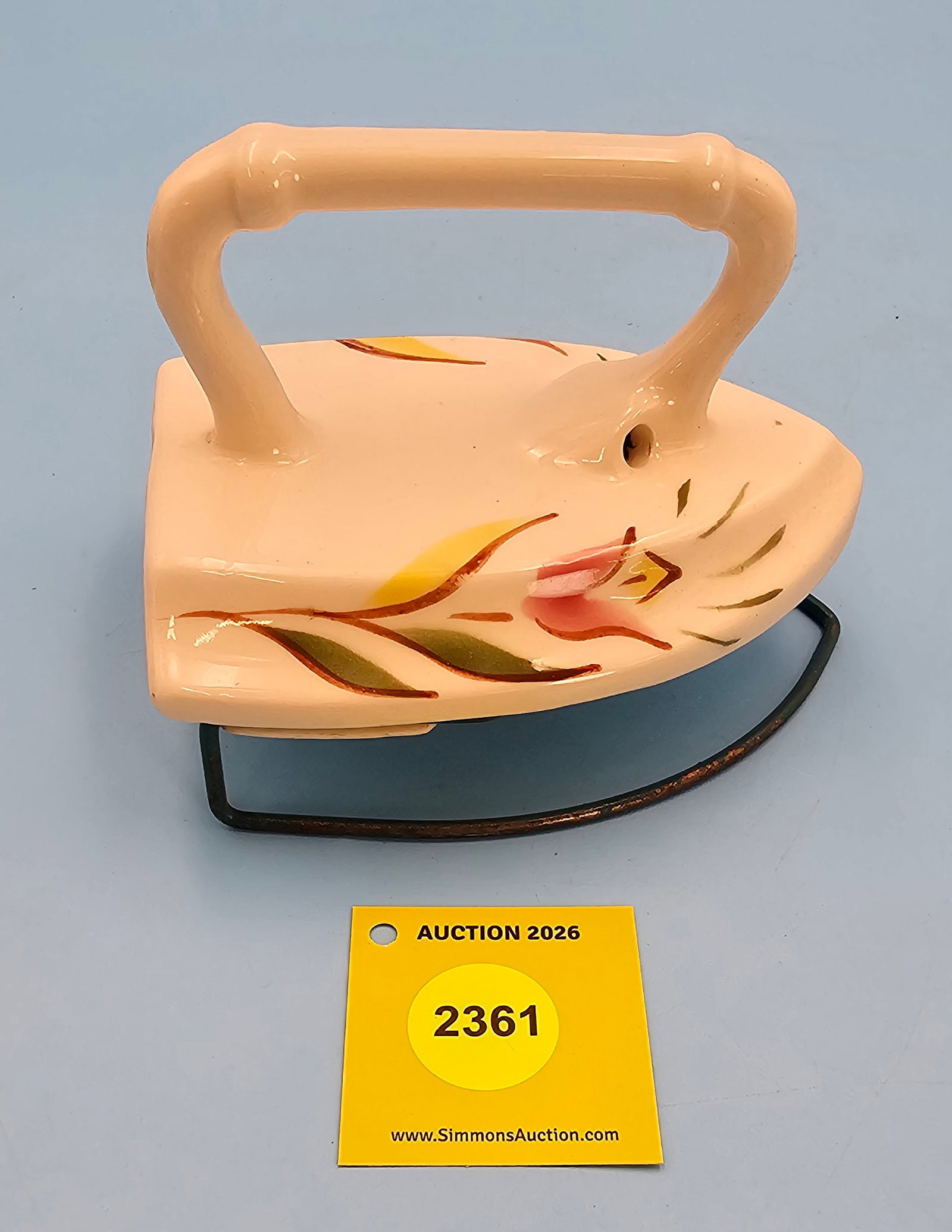 Ceramic iron shaped napkin holder w/painted tulips (1 of 1)