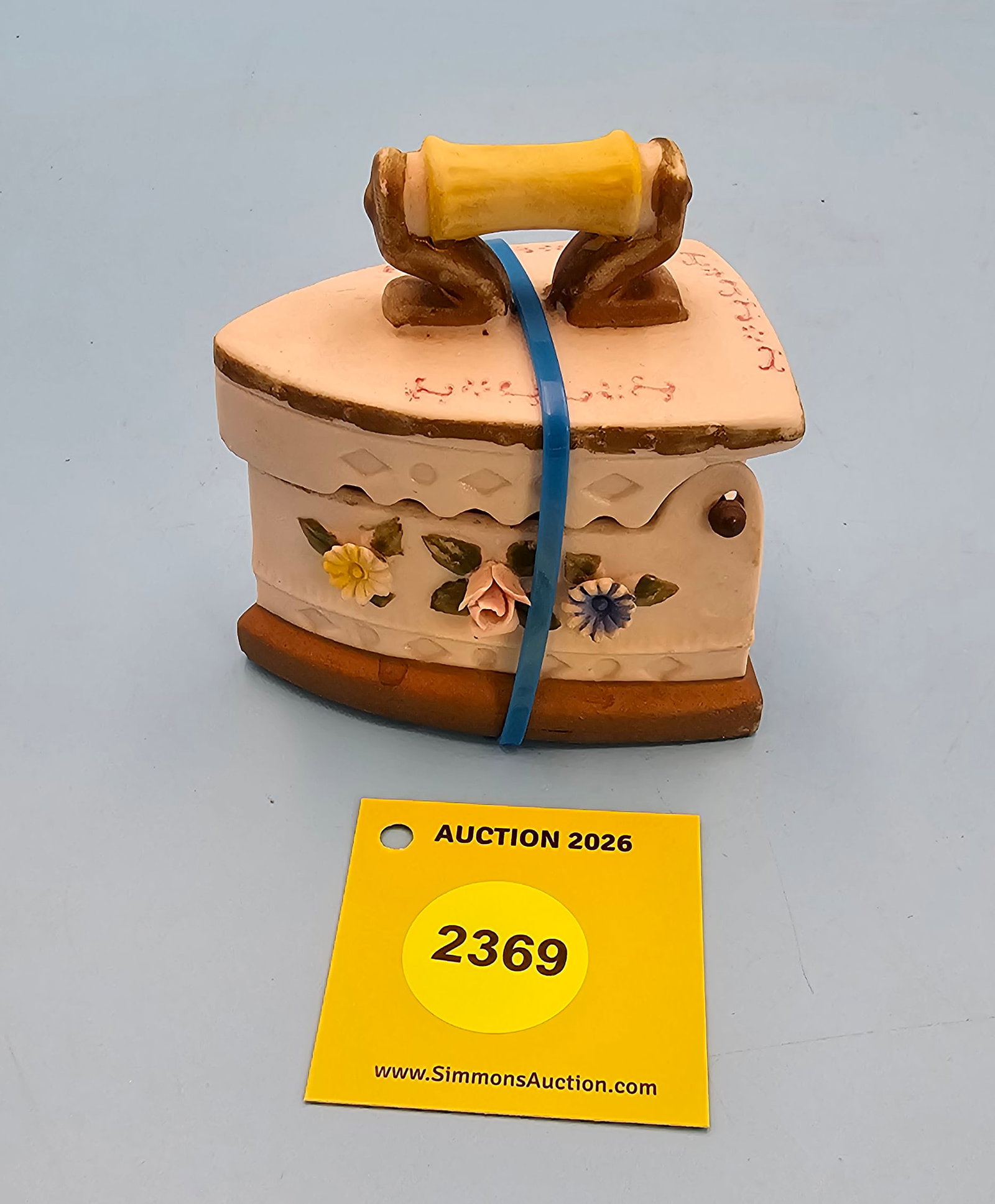 Porcelain iron trinket holder w/3d flowers 3 1/4 x 2 1/4 x 3 1/2": Porcelain iron trinket holder w/3d flowers 3 1/4 x 2 1/4 x 3 1/2"