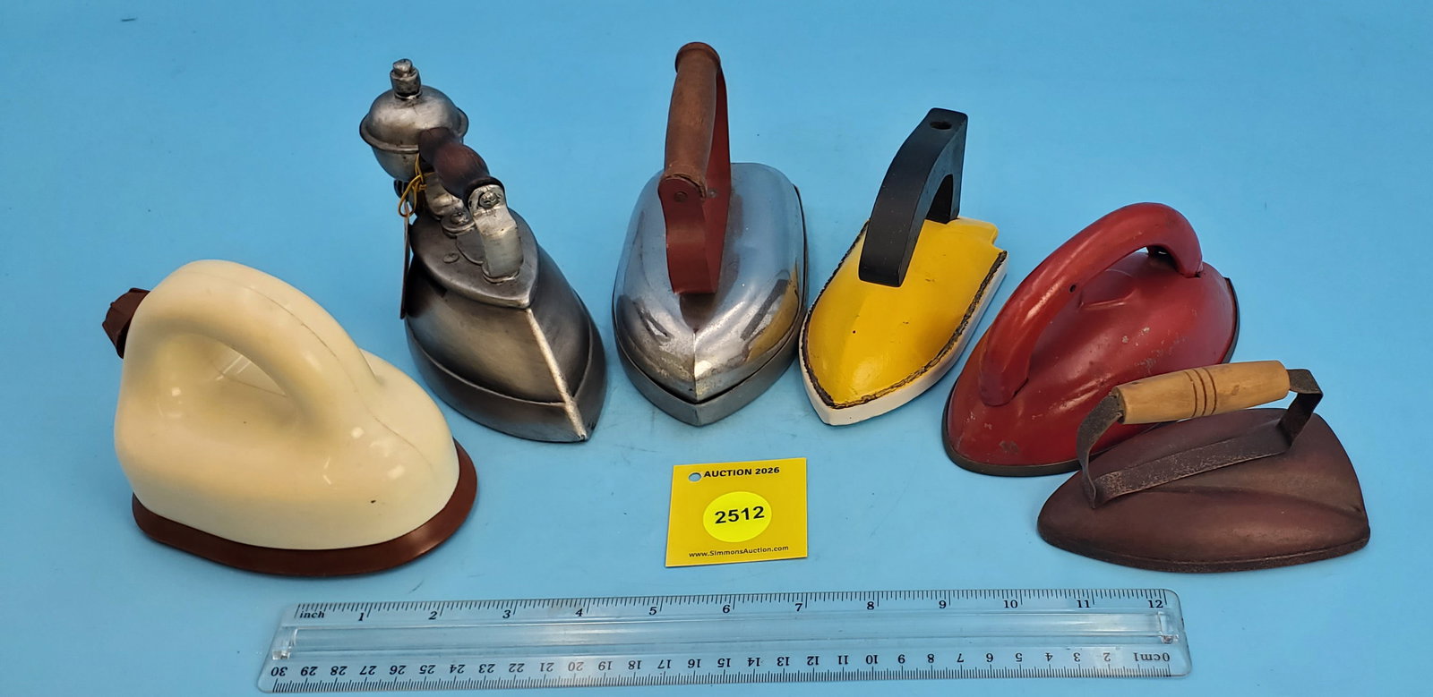 Lot of 12, toy irons (1 of 2)