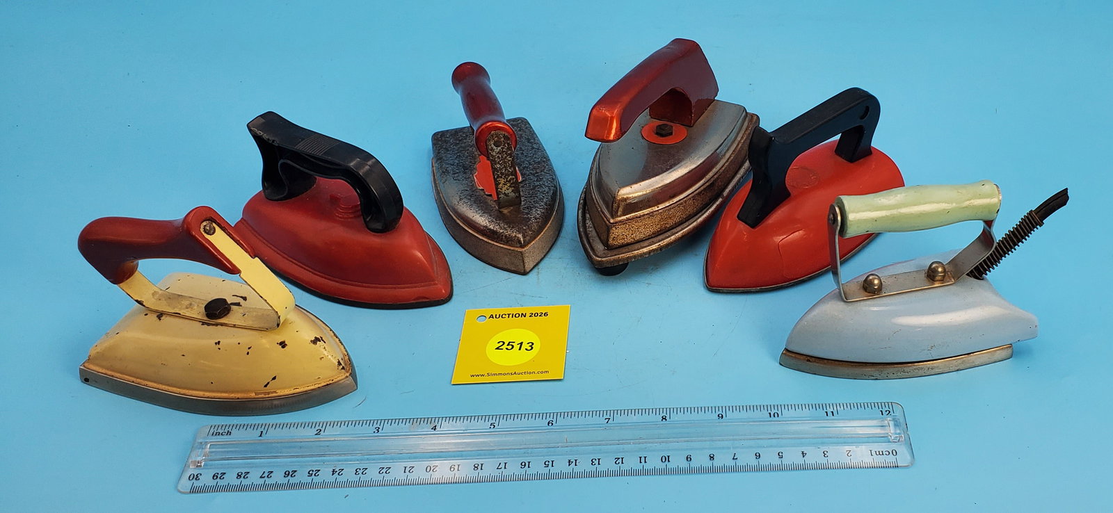 Lot of 13, toy irons (1 of 2)