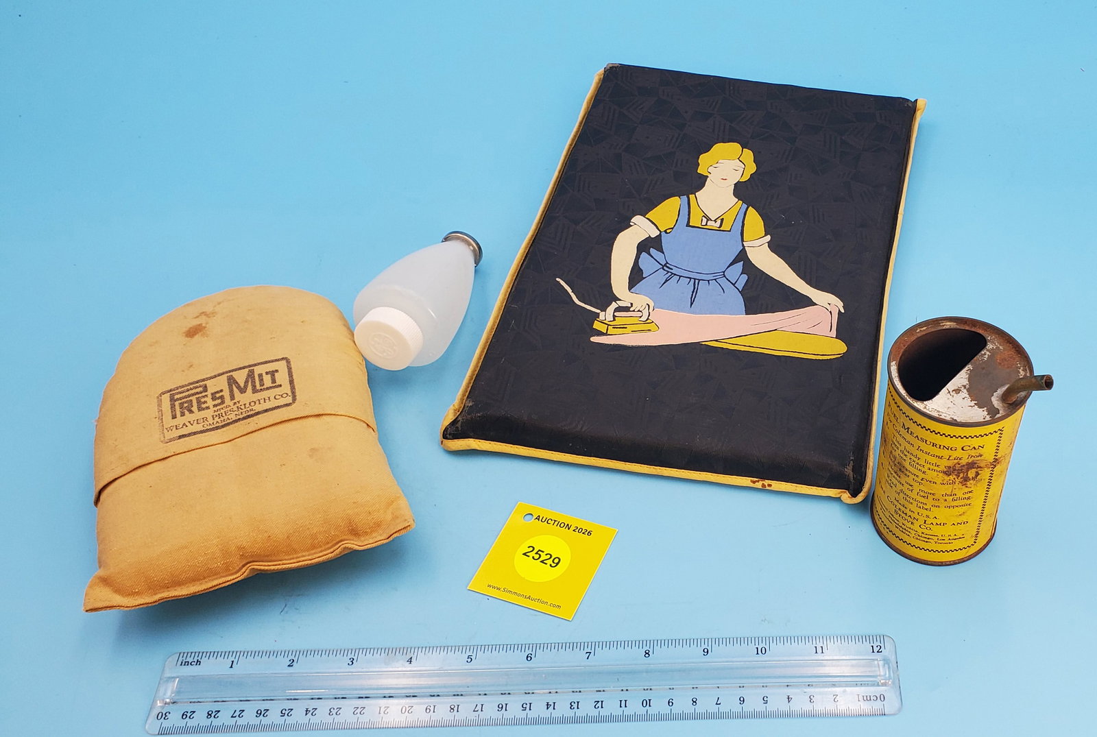 Large lot of various iron advertising, poster, calendar, pressing mit, ironing wax, fuel measurin...: Large lot of various iron advertising, poster, calendar, pressing mit, ironing wax, fuel measuring can, ect.