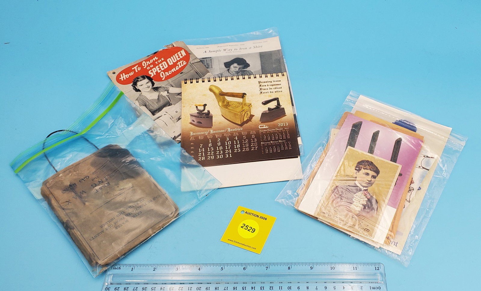 Large lot of various iron advertising, poster, calendar, pressing mit, ironing wax, fuel measurin... - 2