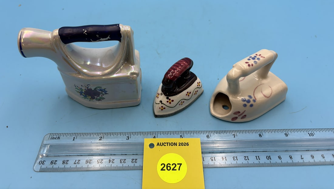 Lot of 3 ceramic SAD irons, one salt and pepper shaker, one tooth pick holder.: Lot of 3 ceramic SAD irons, one salt and pepper shaker, one tooth pick holder.
