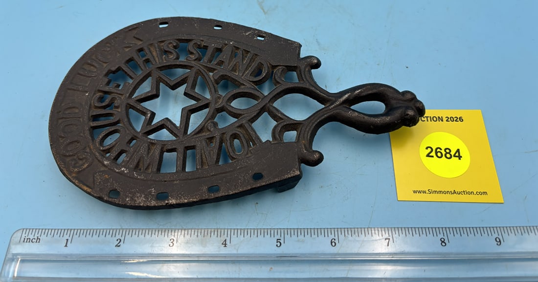 "Good Luck to all who use this stand" in horseshoe JZH trivet w/ three legs (1 of 2)
