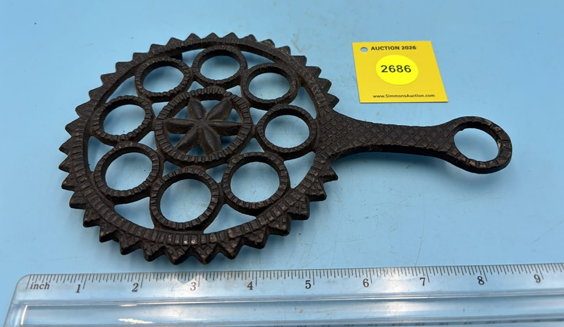 Round trivet w/ handle JZH hex sign T-9 w/ three legs (1 of 2)