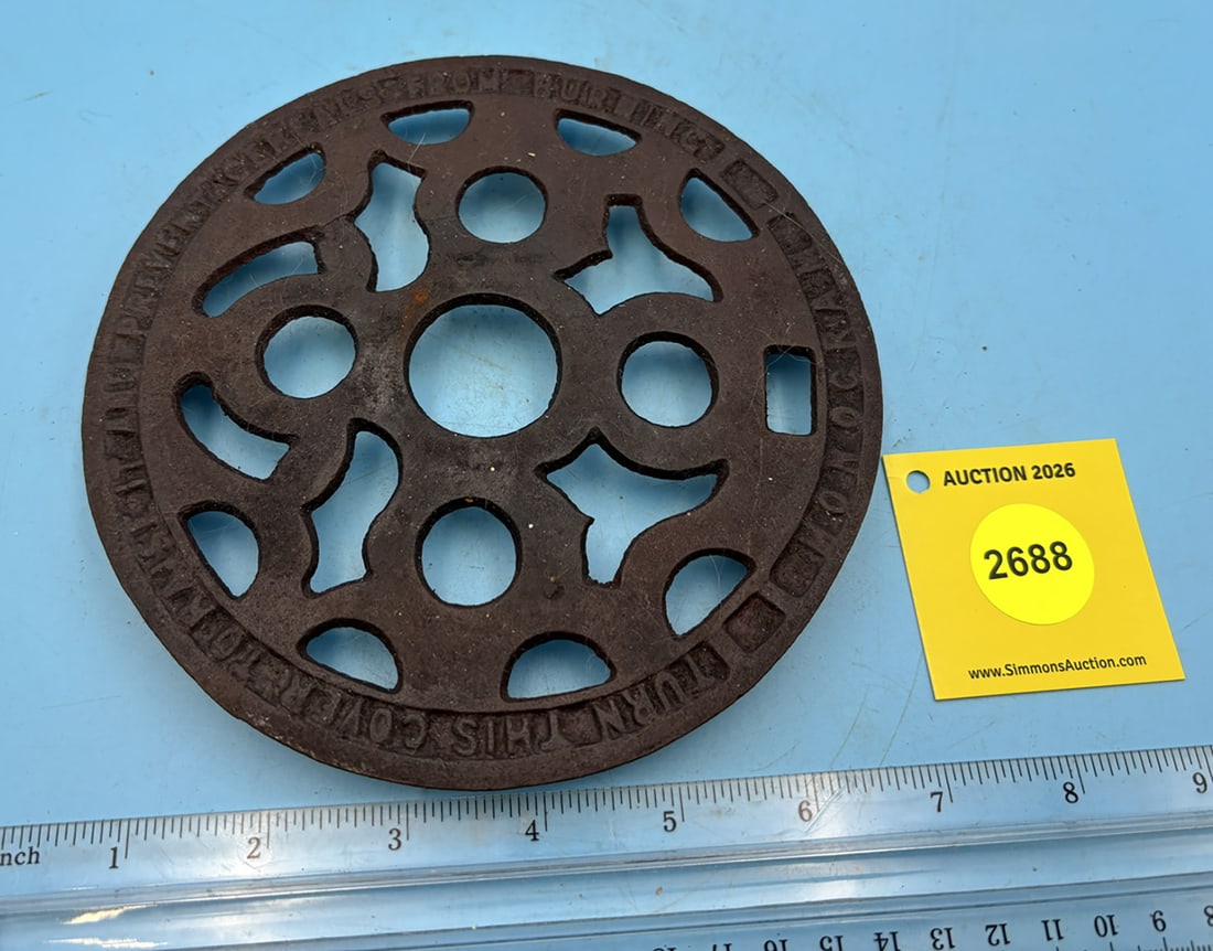 "Turn this cover to raise it and prevent cereals from burning" round cover w/ three legs (1 of 2)