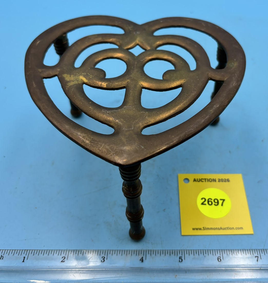 Brass heart shaped trivet on three tall legs (1 of 2)