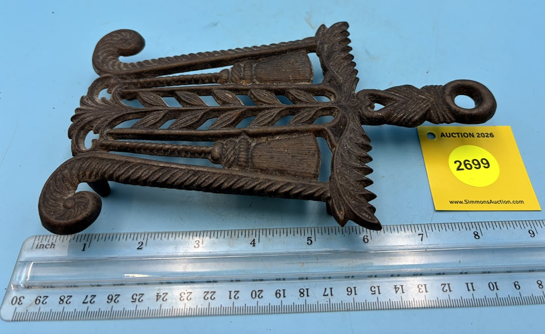 Grain and Tassel/ Lincoln Drape trivet w/ four feet and handle (1 of 2)