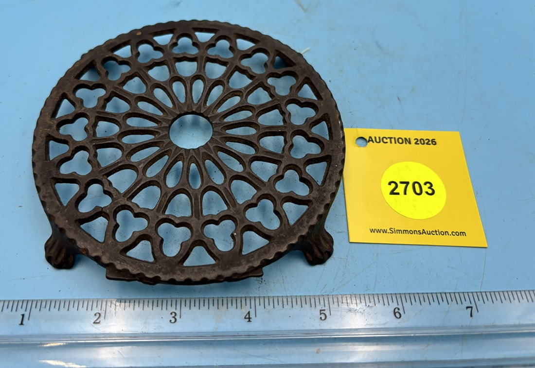 "Lantz type trivet, round w/ four pawed feet: "Lantz type trivet, round w/ four pawed feet