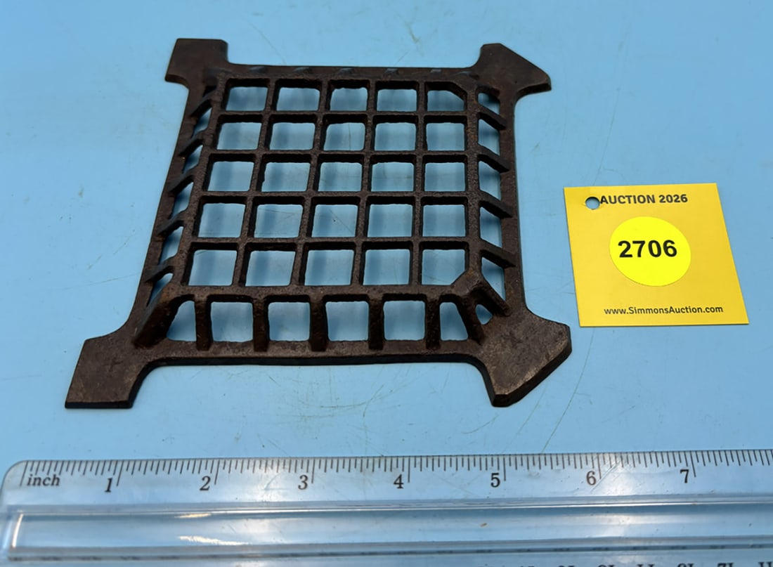 Square trivet w/ four pad feet, grid on top and sides: Square trivet w/ four pad feet, grid on top and sides
