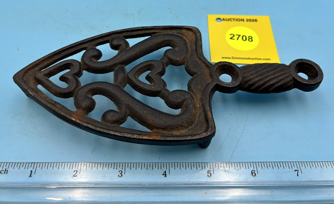 Heart and Urn trivet w/ handle and three legs (1 of 2)