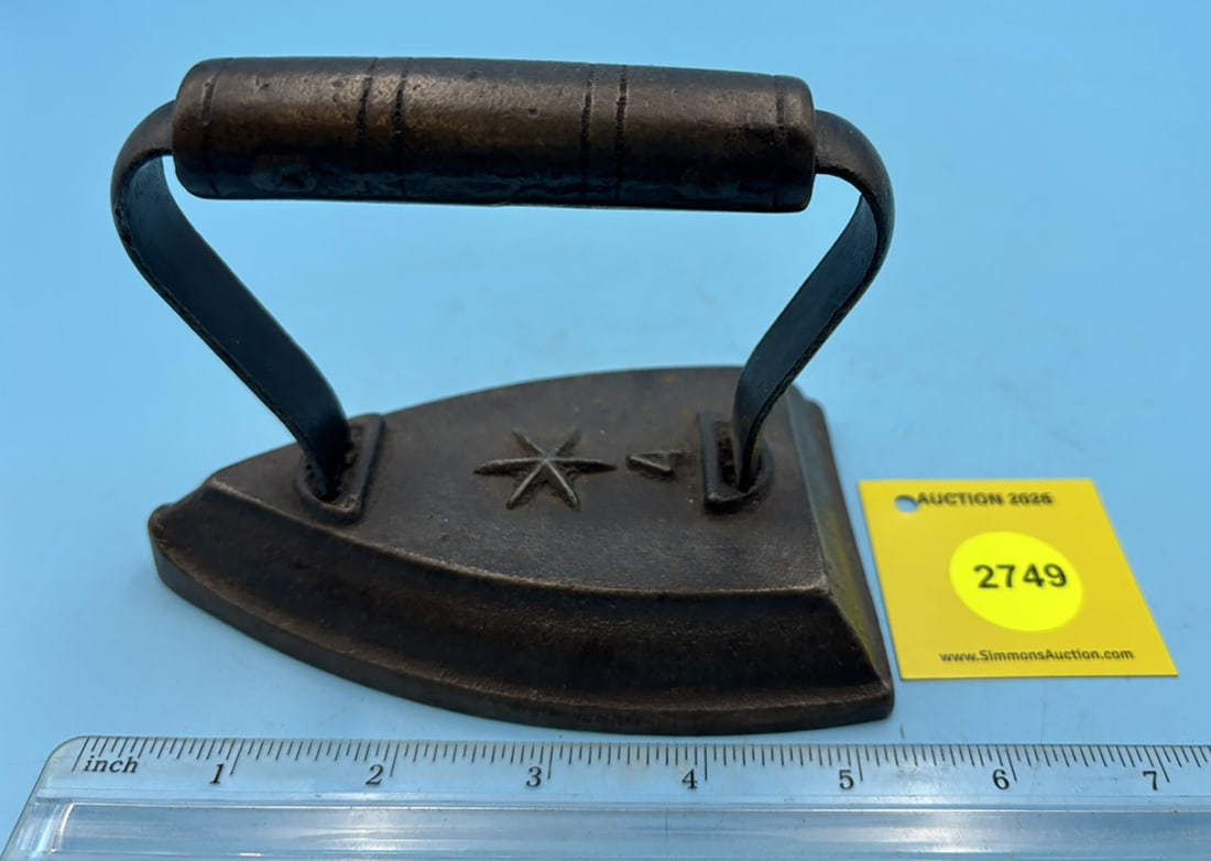 One piece flat iron w/ star and "4": One piece flat iron w/ star and "4"