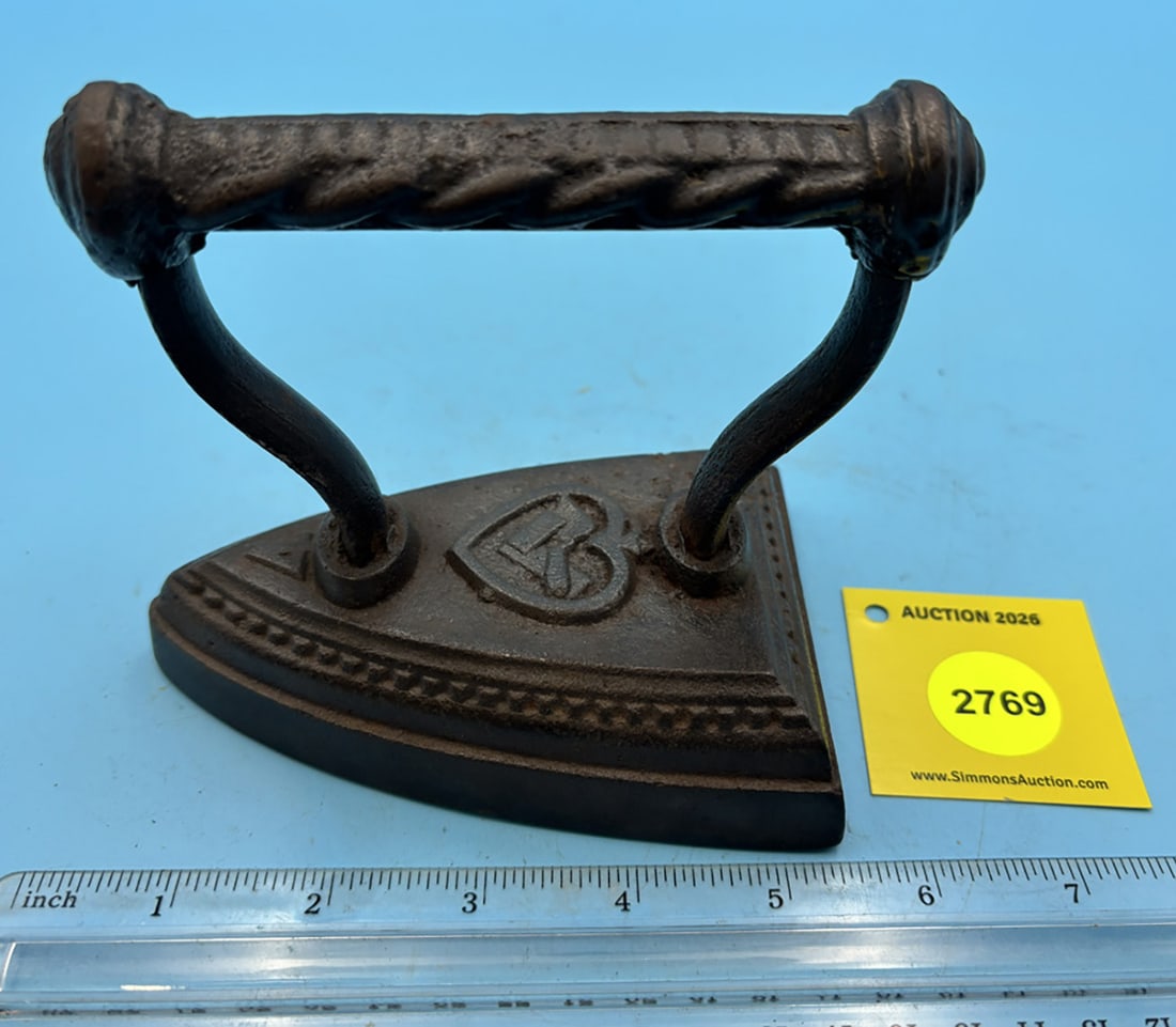 one piece flat iron w/ masonic symbol and "4": one piece flat iron w/ masonic symbol and "4"