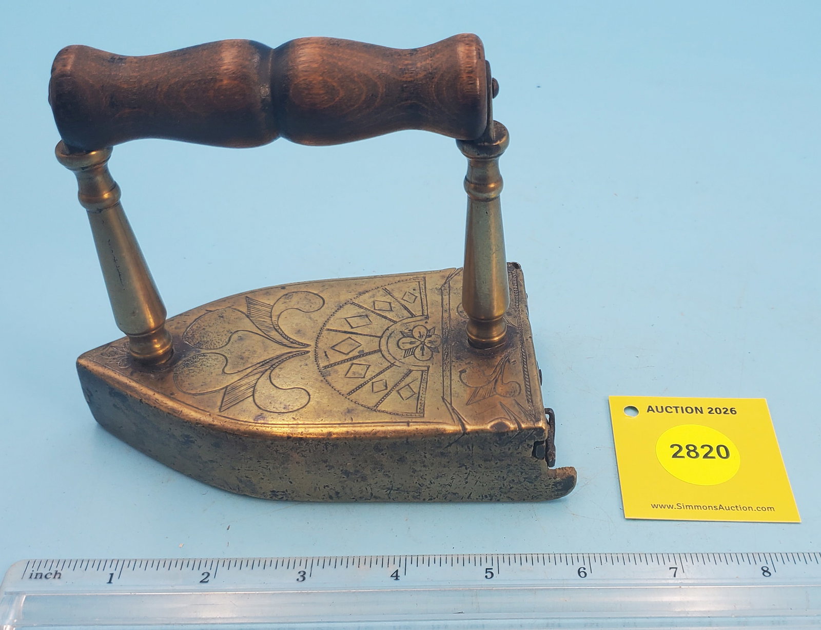 Brass box iron w/engraved top, swing gate, w/slug (1 of 3)