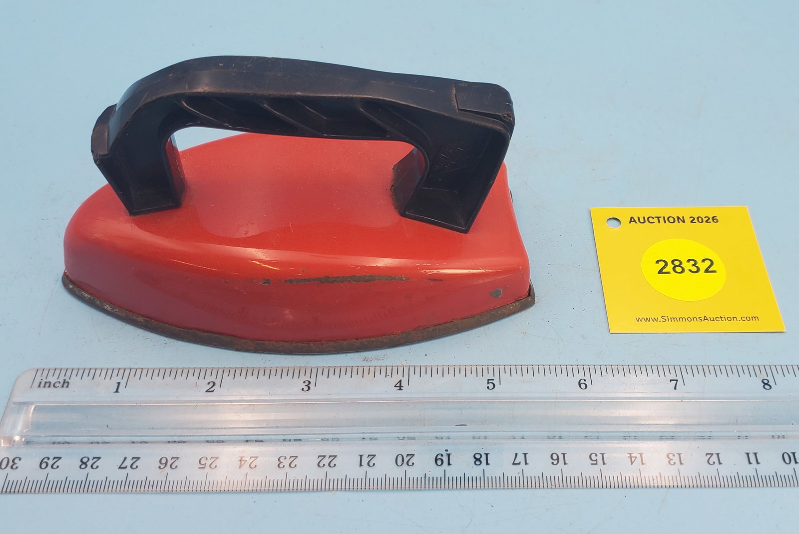 Wolverine tin child's electric iron, red body, black handle: Wolverine tin child's electric iron, red body, black handle