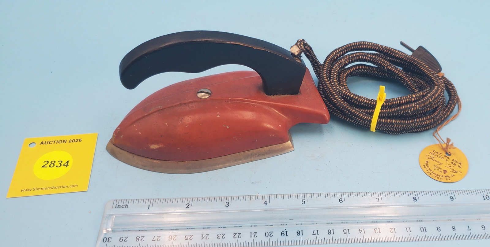"Sunny Suzy" child's streamlined electric iron, red w/black handle: "Sunny Suzy" child's streamlined electric iron, red w/black handle