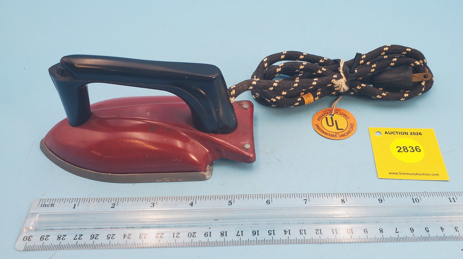 "Sunny Suzy"/Wolverine Supply Co streamlined iron, red w/black handle (1 of 2)