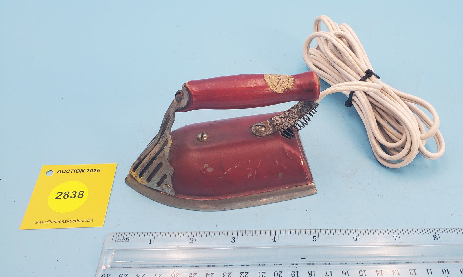 Art deco child's electric iron, red w/metal grill on front (1 of 2)