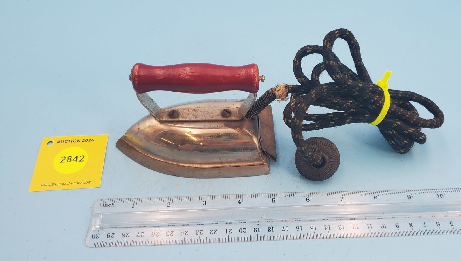 Small electric iron, child's or utility, red hand grip (1 of 2)