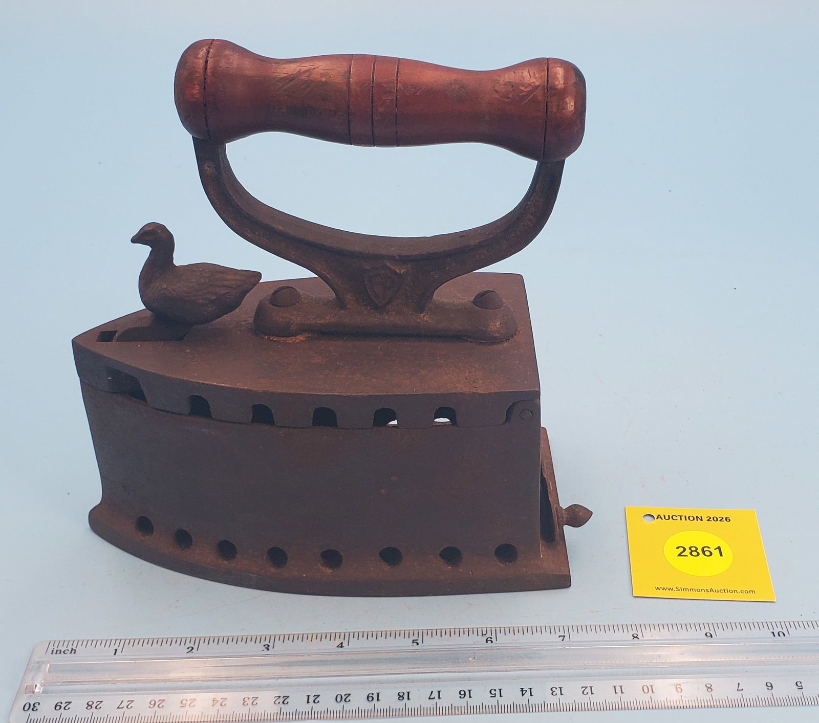 Flat back charcoal iron, FP. Duck on Knob to release hinged top: Flat back charcoal iron, FP. Duck on Knob to release hinged top