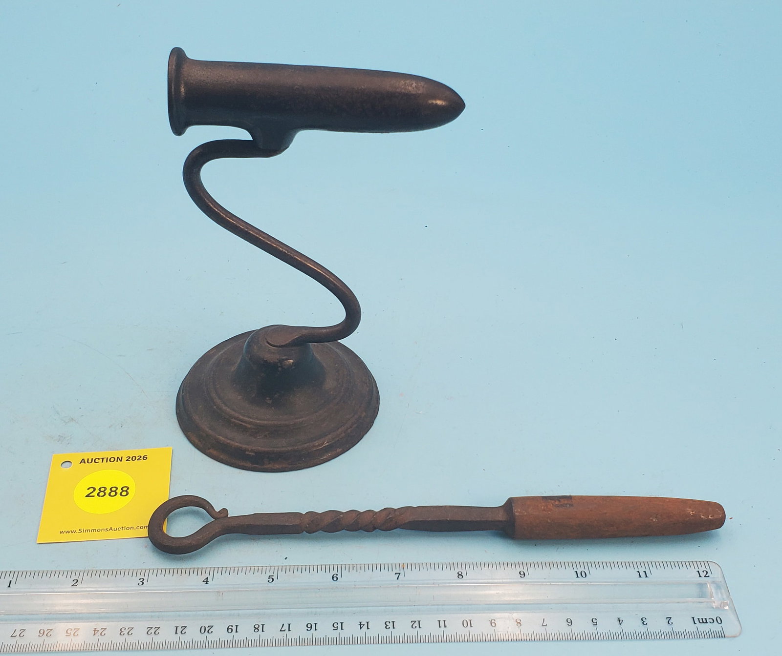 Goffering iron, twisted handle, illegible lettering under base: Goffering iron, twisted handle, illegible lettering under base