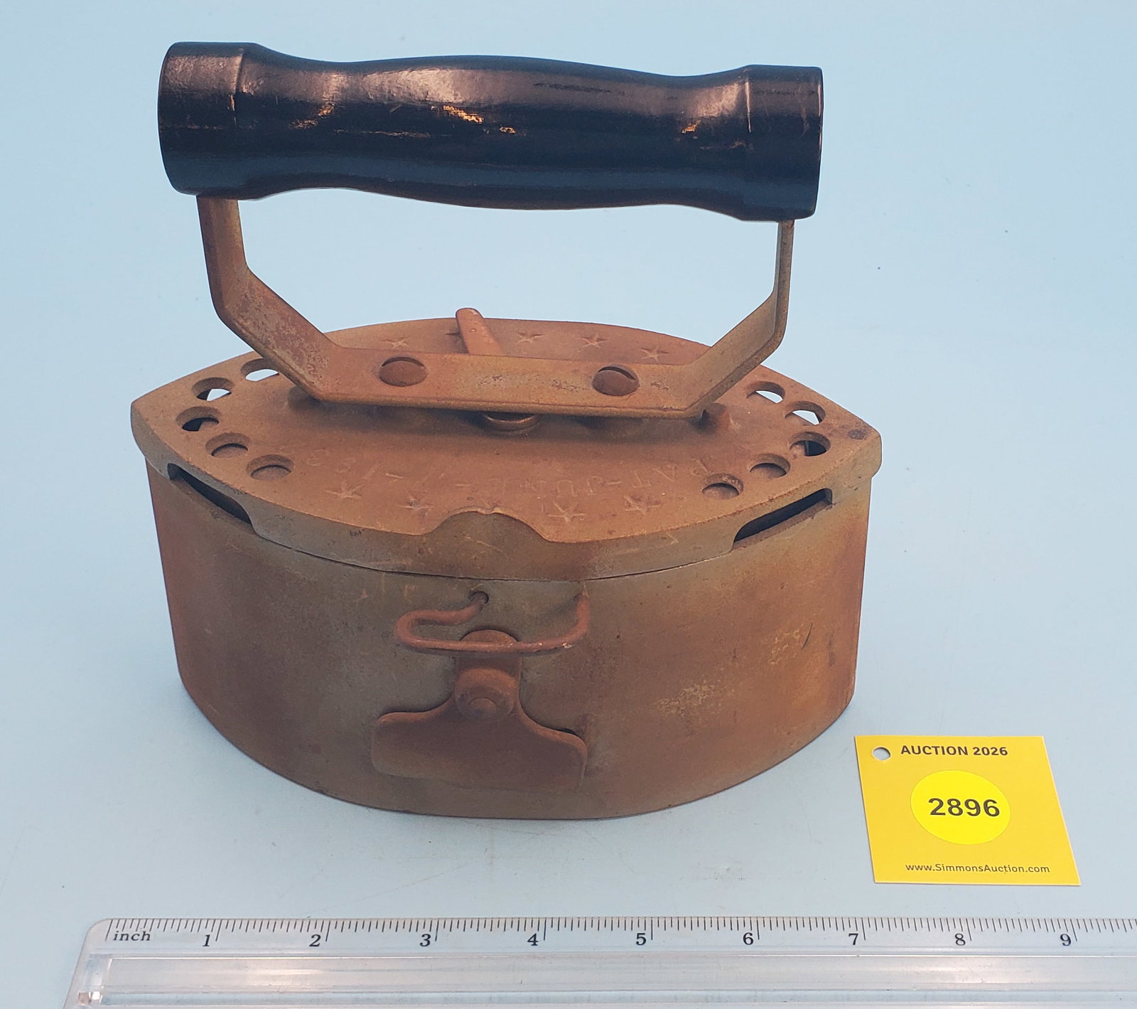 Double point charcoal iron, stars on top, lift off lid. PAT JUNE 7, 1932 - 2