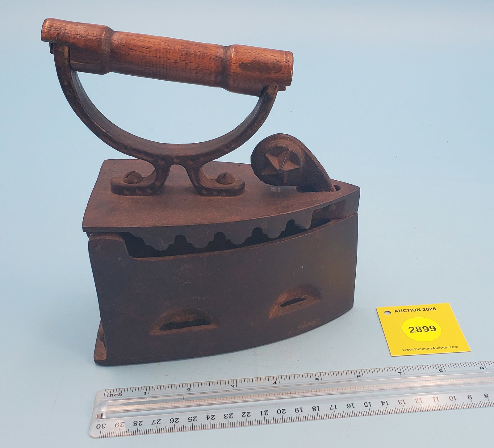 Flat back Charcoal iron, Star on knob to release hindged top - 3