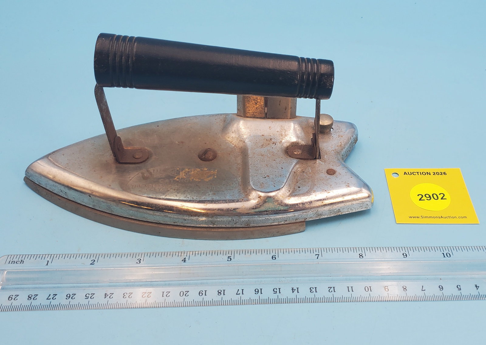 Electric iron, thin sole. Side electric connection, Nelson Machine & MFG Co. Cleveland, OH - 2