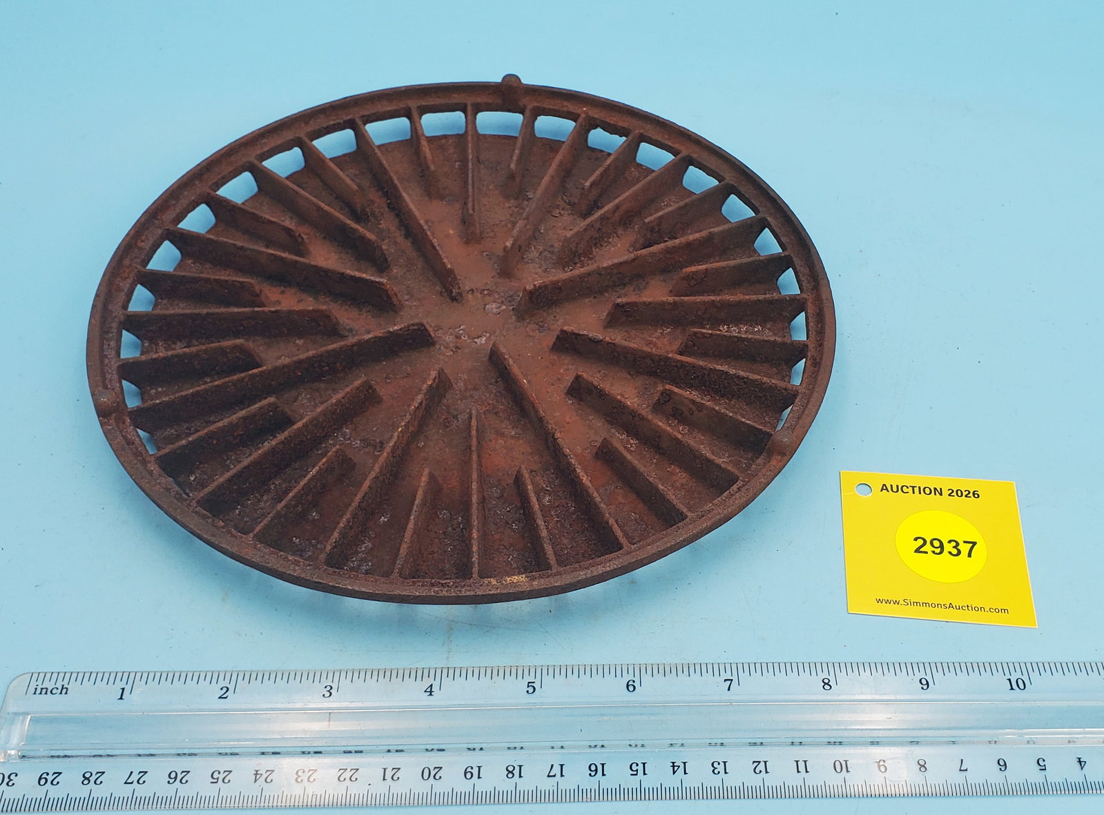 Sad iron heater, 8 3/4" diameter, partially legible patent date (1 of 2)