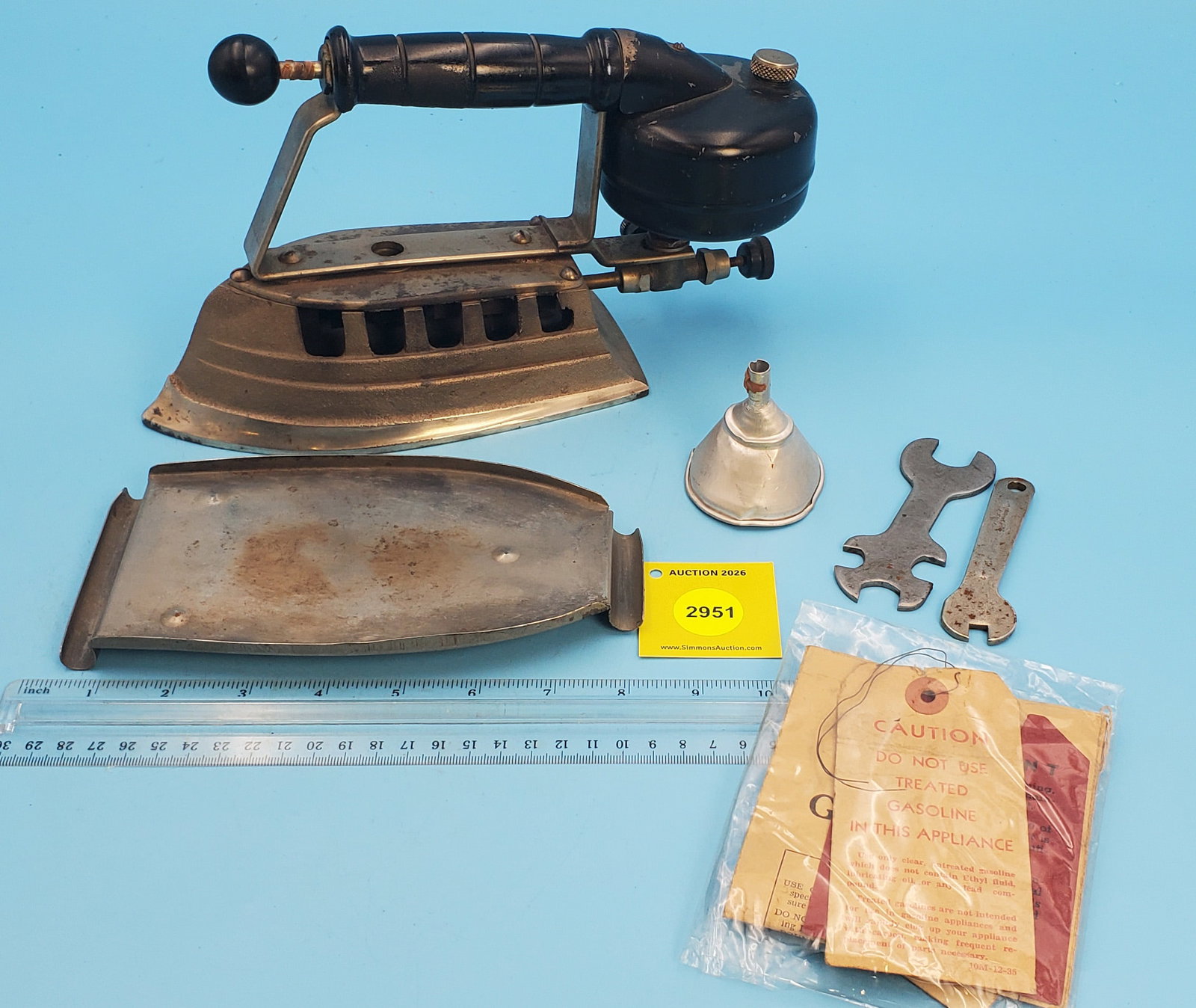 Gasoline iron, black tank and handle, pump in handle, w/trivet, wrench, funnel and booklet (1 of 2)