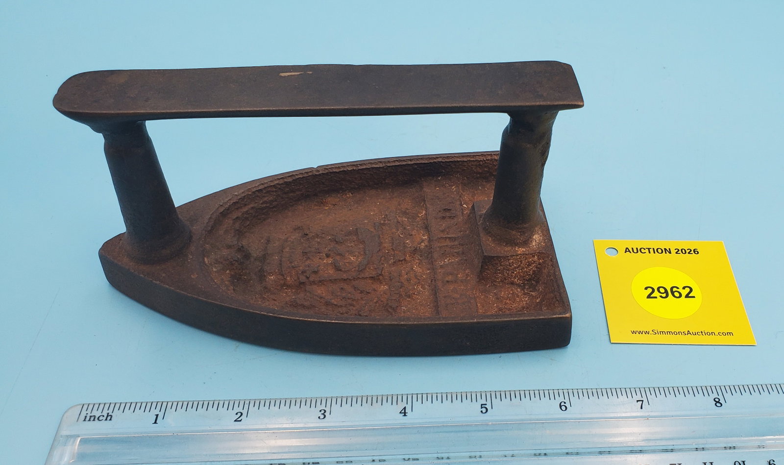 French flat iron, crest LeParisien in recessed area: French flat iron, crest LeParisien in recessed area