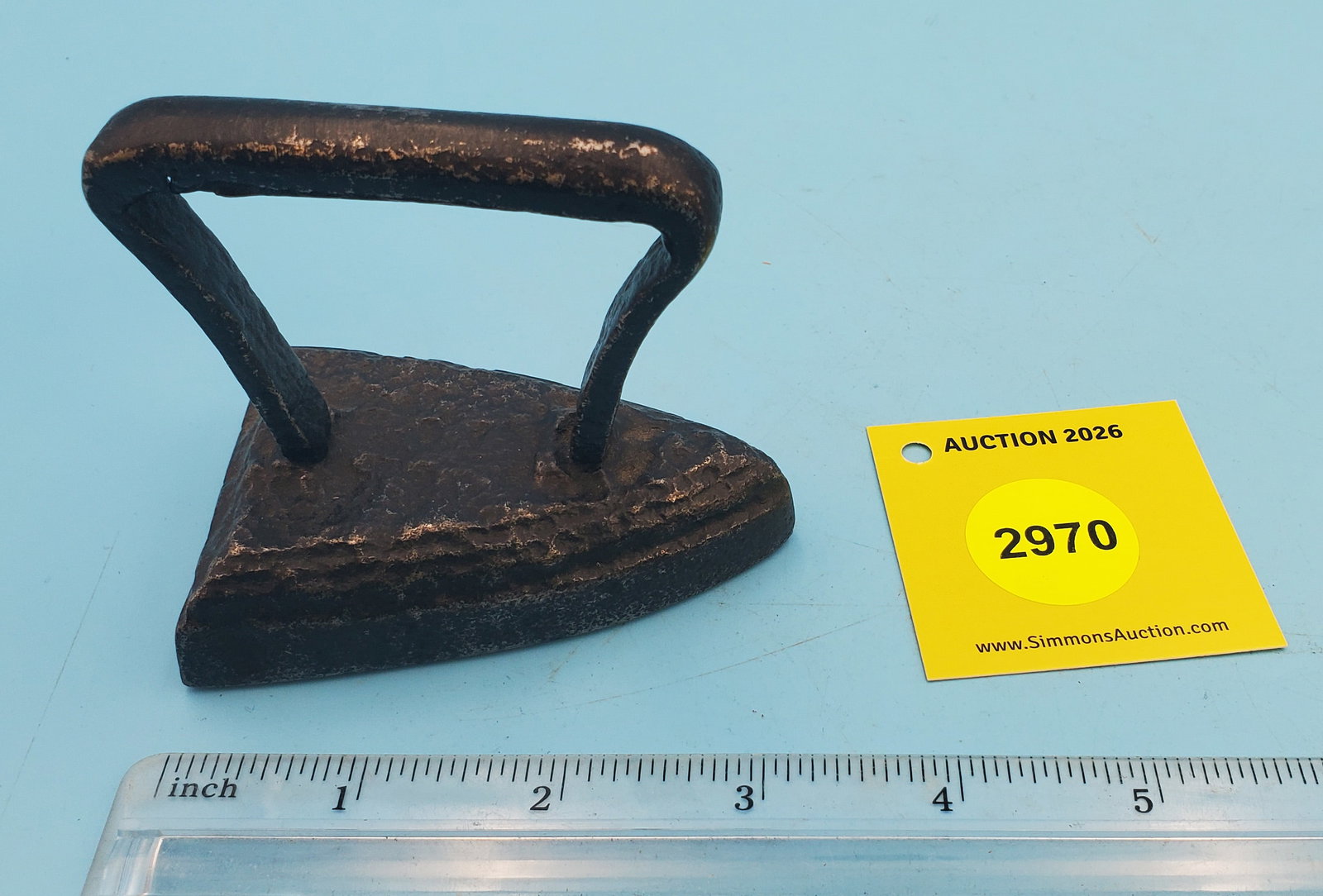 one piece child's iron, strap handle (1 of 2)