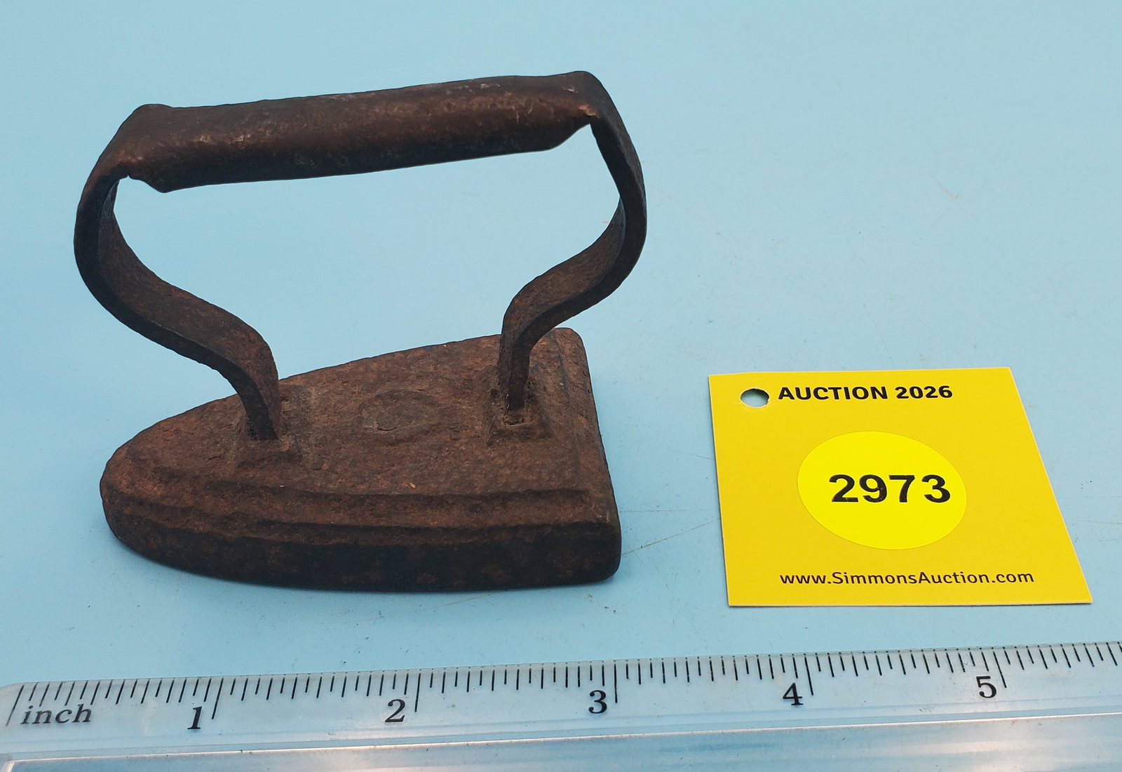 one piece child's iron, "O", strap handle: one piece child's iron, "O", strap handle