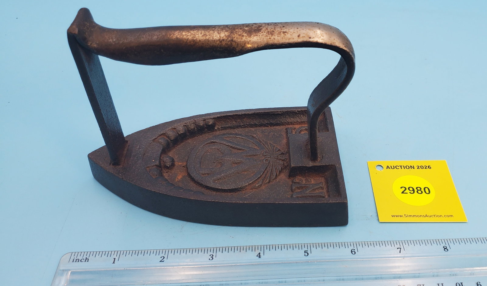 French falt iron, crest w/ DW #5 in recessed area - 2