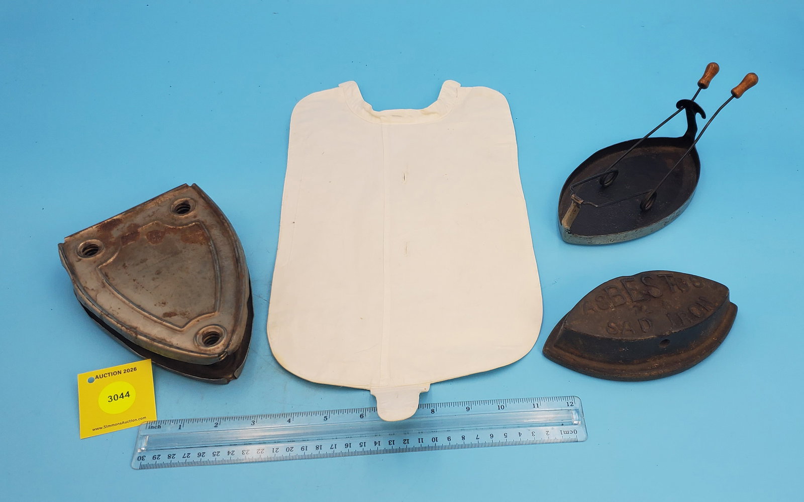 Lot of 4, misc trivets, sad iron base and bosom board shirt front (1 of 1)