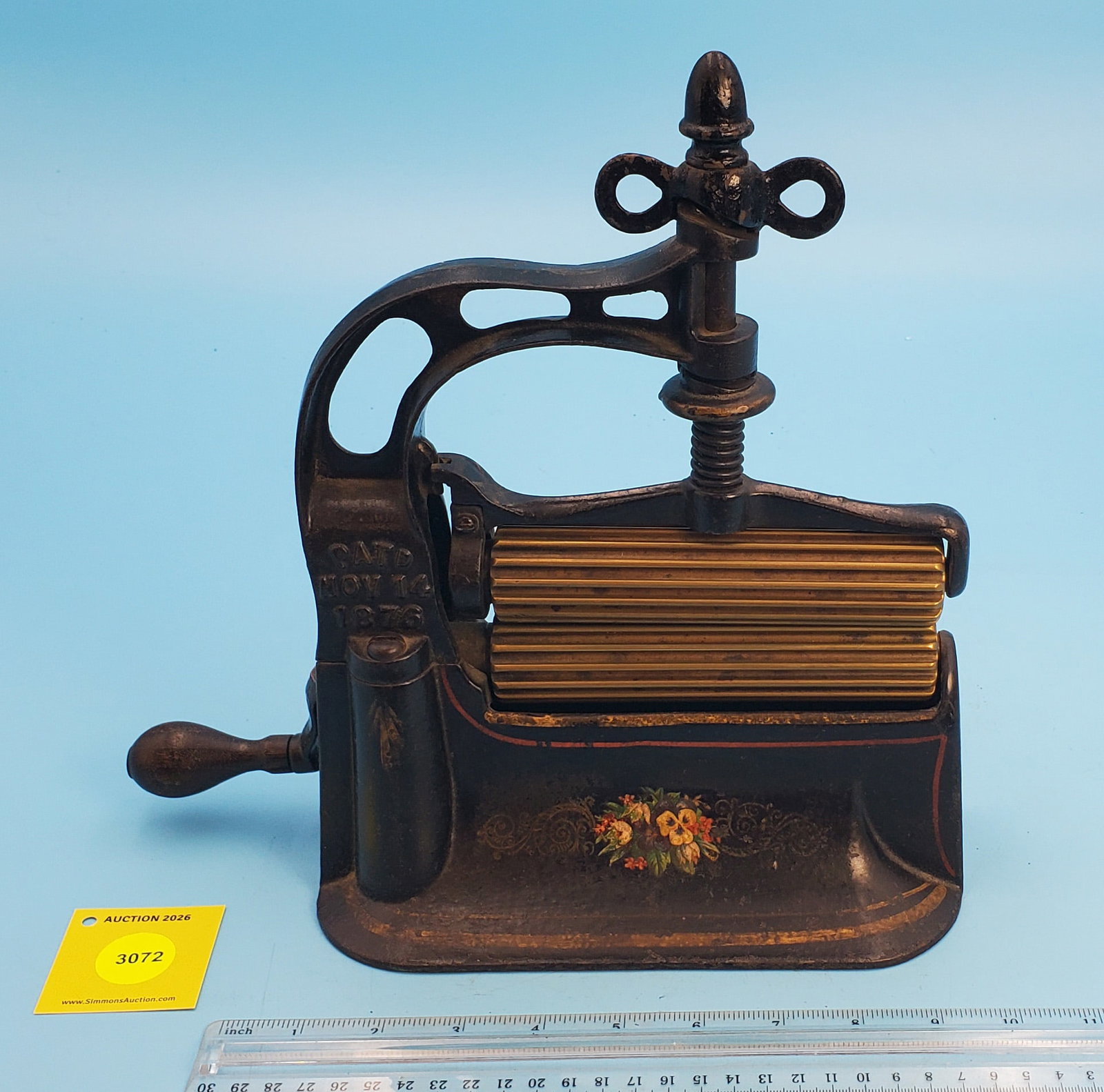 Machine, Dudley Fluter, Patd Nov 14, 1876, red pinstriping on black w/flower decals, roll 5 3/4" no (1 of 2)