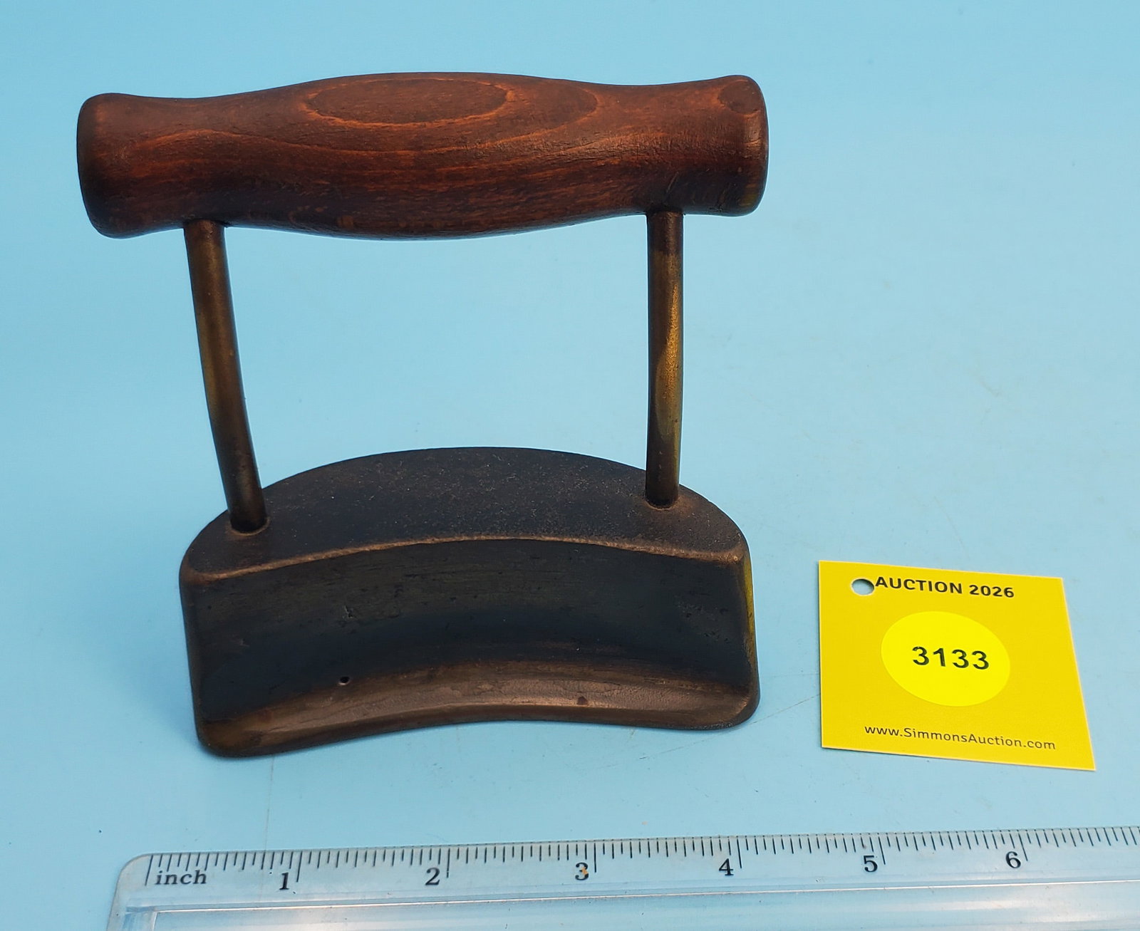 Hat iron, wood grip, smooth bottom, curved edge: Hat iron, wood grip, smooth bottom, curved edge