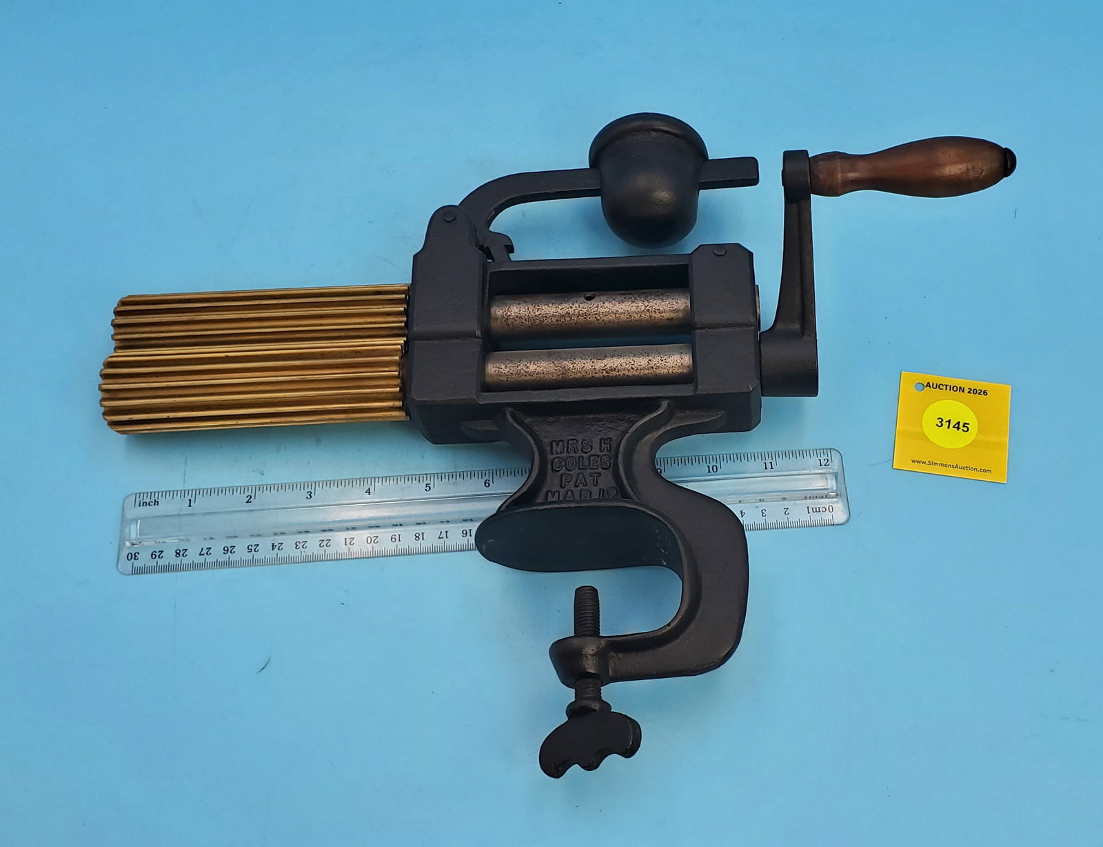 Clamp on machine fluter, Mrs. Coles, Pat March 12, 1866, roll 5", no slugs (1 of 3)