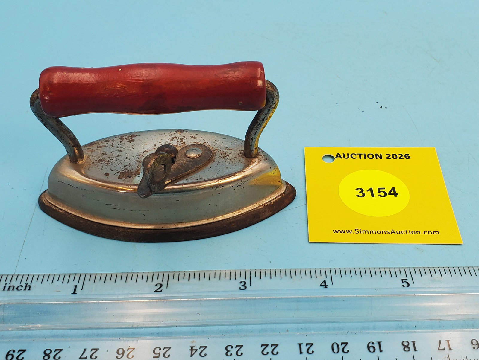 Dover Dolly Iron Made USA, red handle, L 3 1/2": Dover Dolly Iron Made USA, red handle, L 3 1/2"