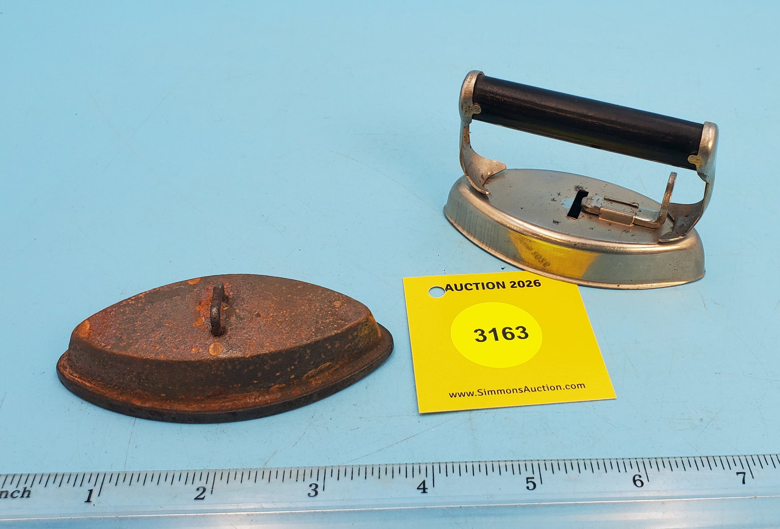 Two piece child's iron, black handle, no markings, L 3 3/8" - 2