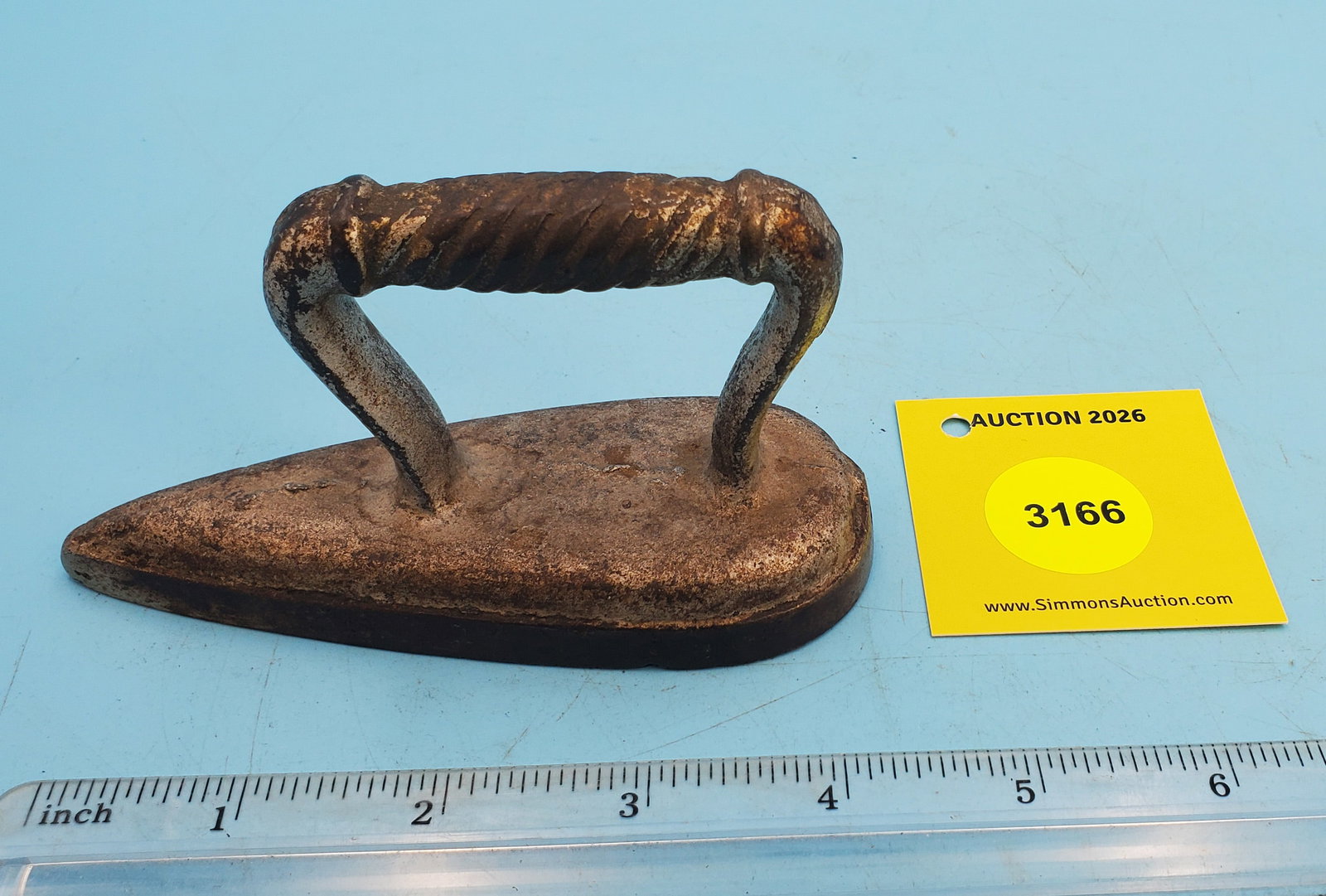 Sleeve iron, rope handle, no markings, L 4 1/2": Sleeve iron, rope handle, no markings, L 4 1/2"