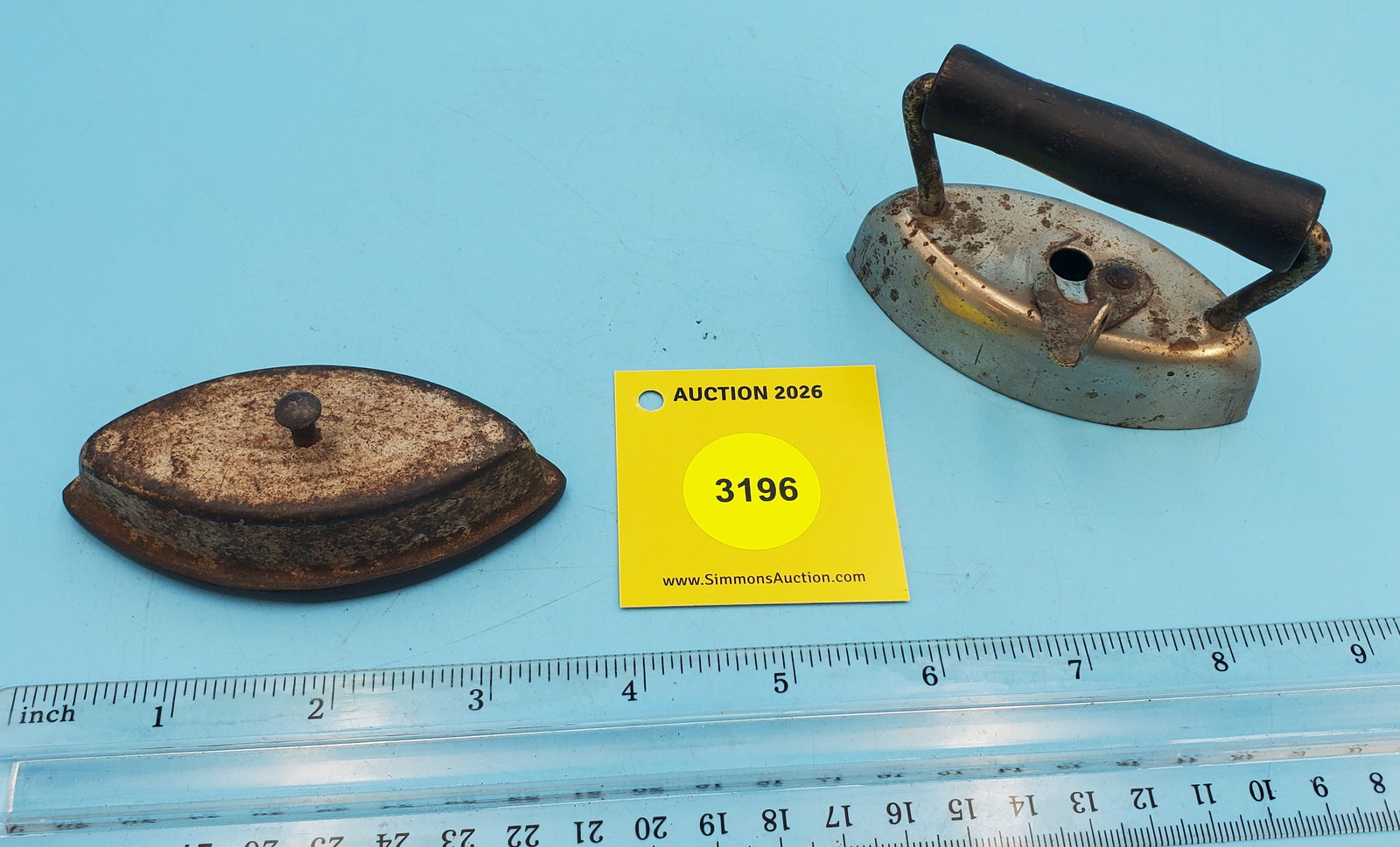 Two piece child's iron, black handle, no markings, L 3 3/8" - 2