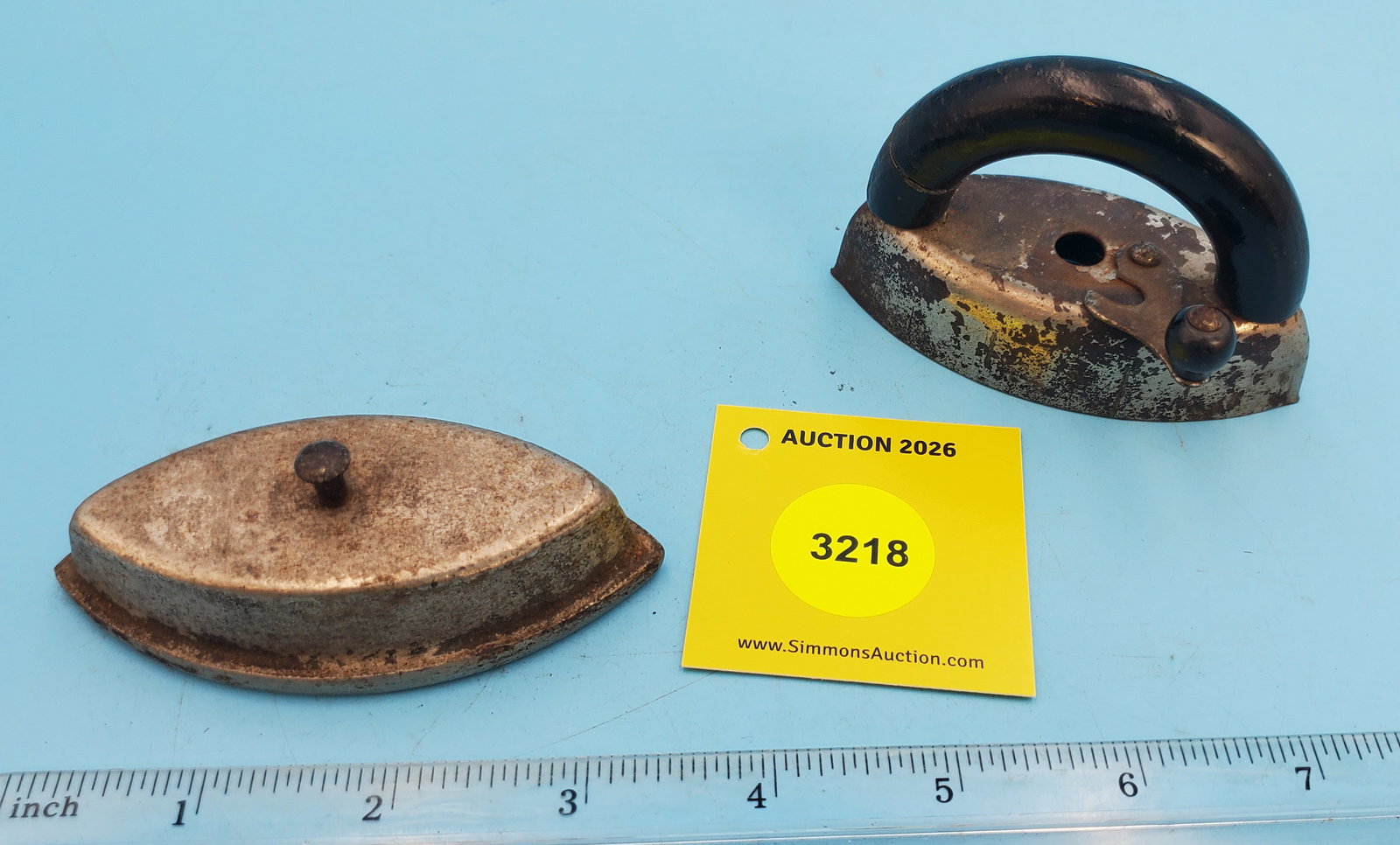 Two piece child's iron, black handle, no markings, L 3 1/2" - 2