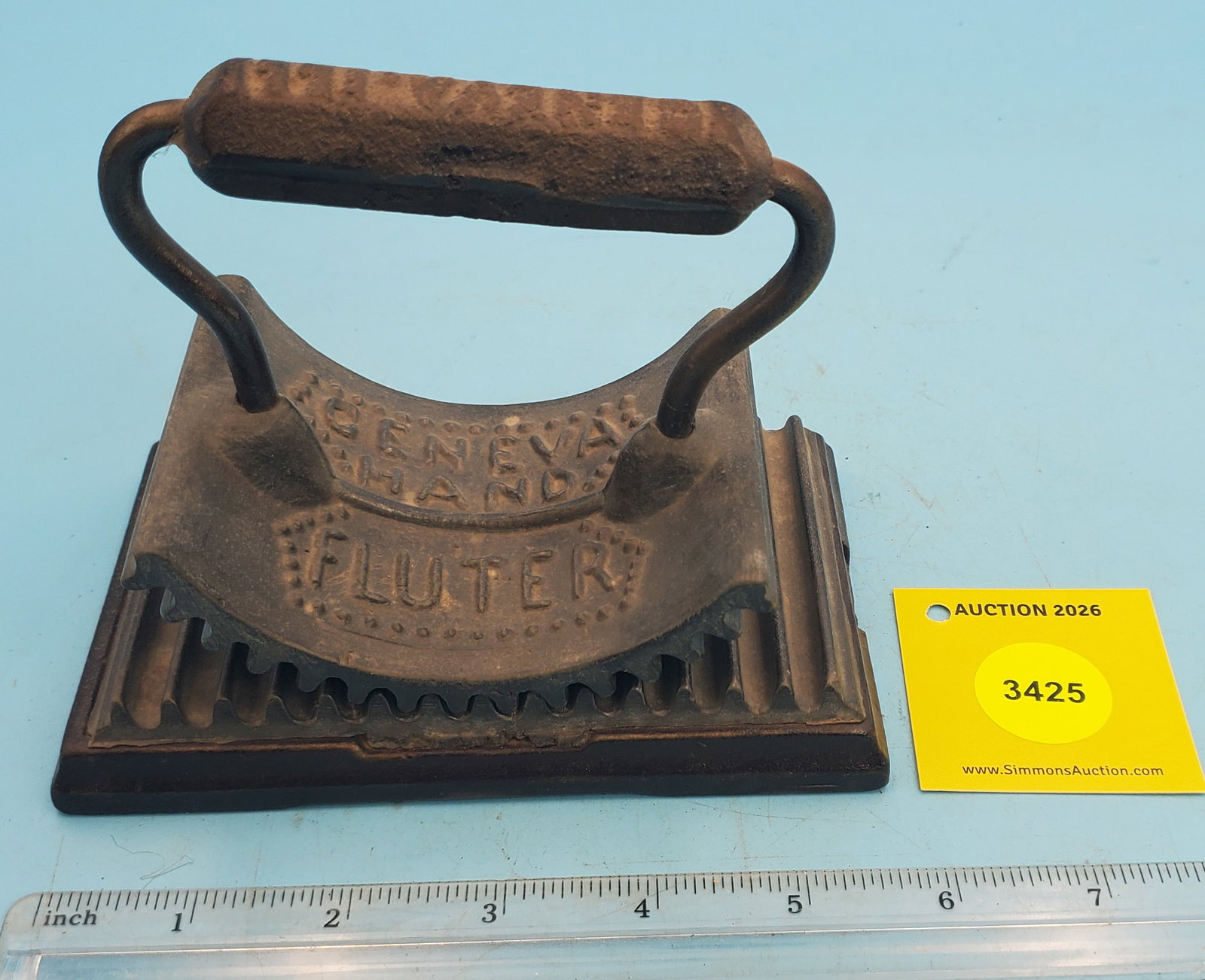 Rocker, Geneva Hand Fluter, Geneva, Ill, Heat this , Pat'd 1866, lead like material for both part...: Rocker, Geneva Hand Fluter, Geneva, Ill, Heat this , Pat'd 1866, lead like material for both parts of fluter, L 5 3/4"