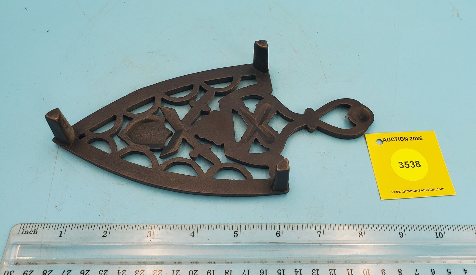 Trivet, spade shaped w/swords and shield - 2