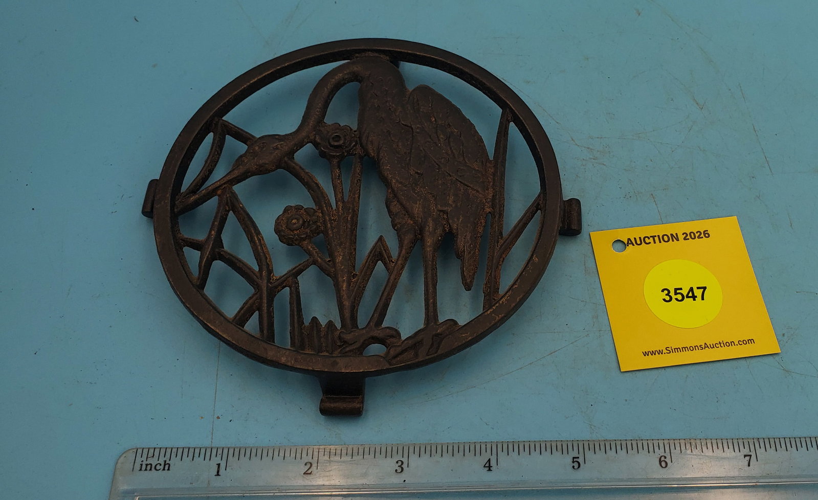 Trivet, round w/crane: Trivet, round w/crane