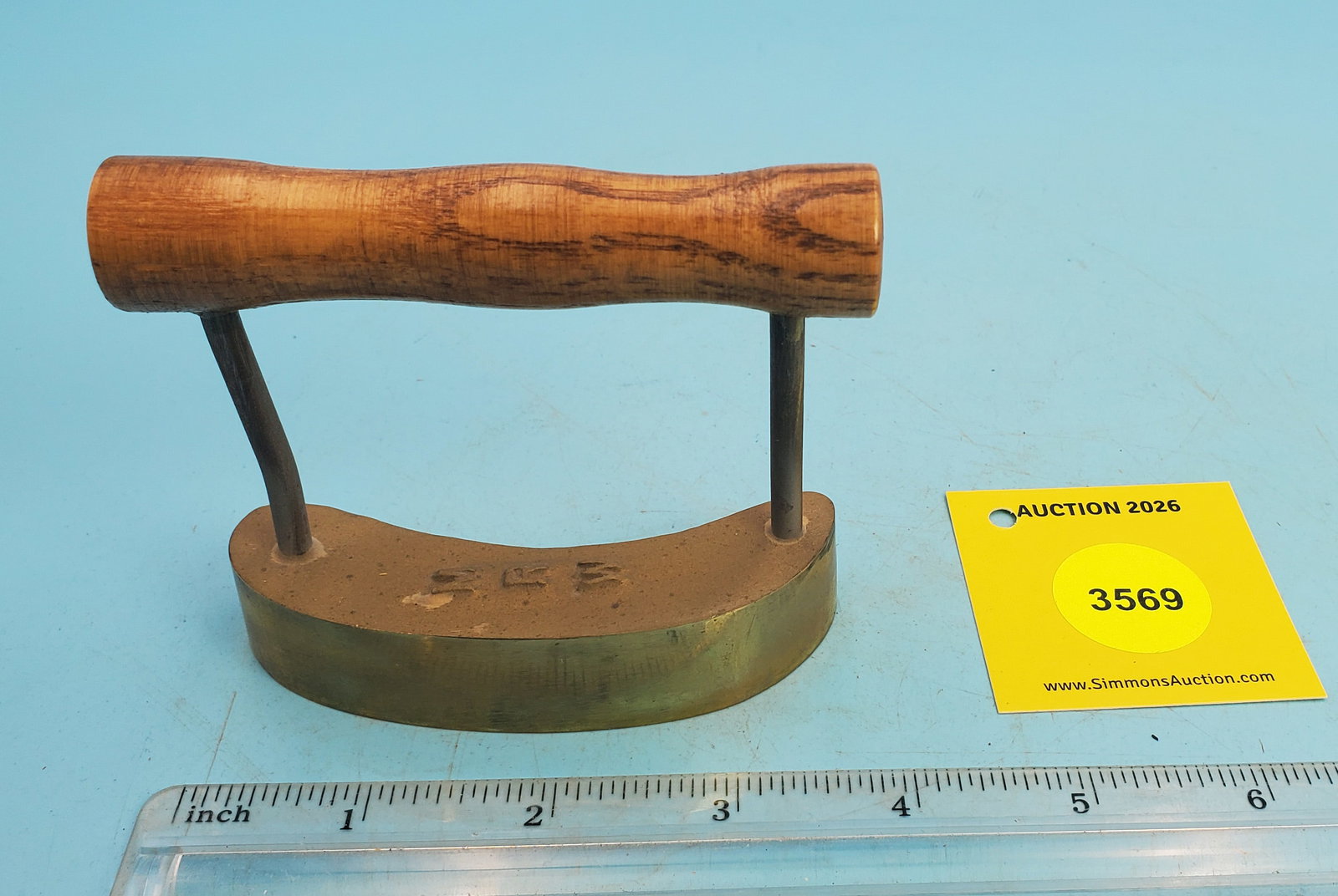 Hatter's iron, M R W on top of iron: Hatter's iron, M R W on top of iron