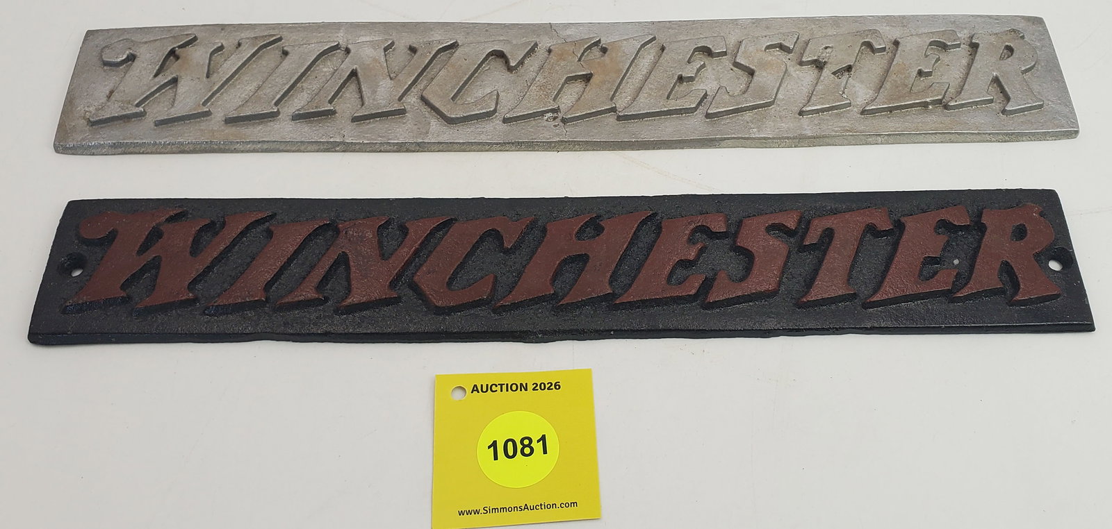 Lot of 2 metal Winchester signs (1 of 2)