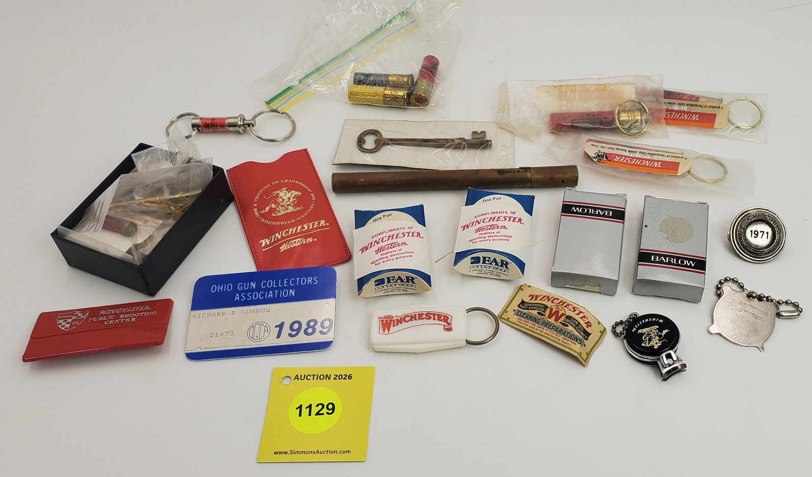 Large lot of Misc items, including Winchester pins, ear plugs, and a key (1 of 1)
